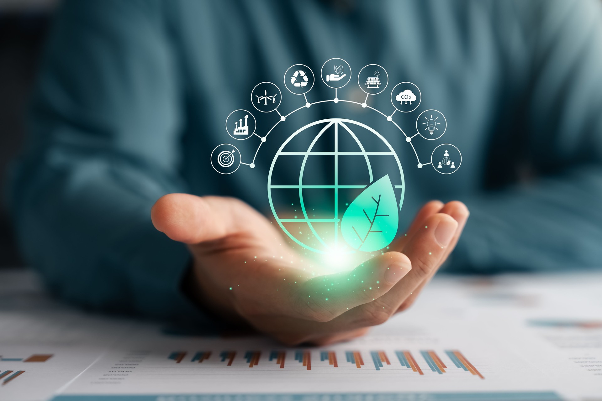 ESG and environmental governance, businessman use laptop research sustainable global clean energy.